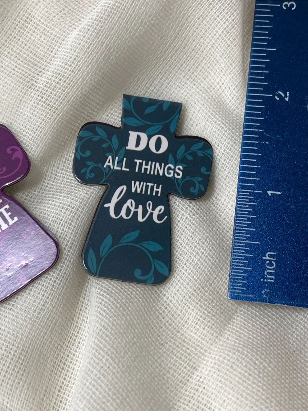 Magnetic cross shaped inspirational bookmarks.